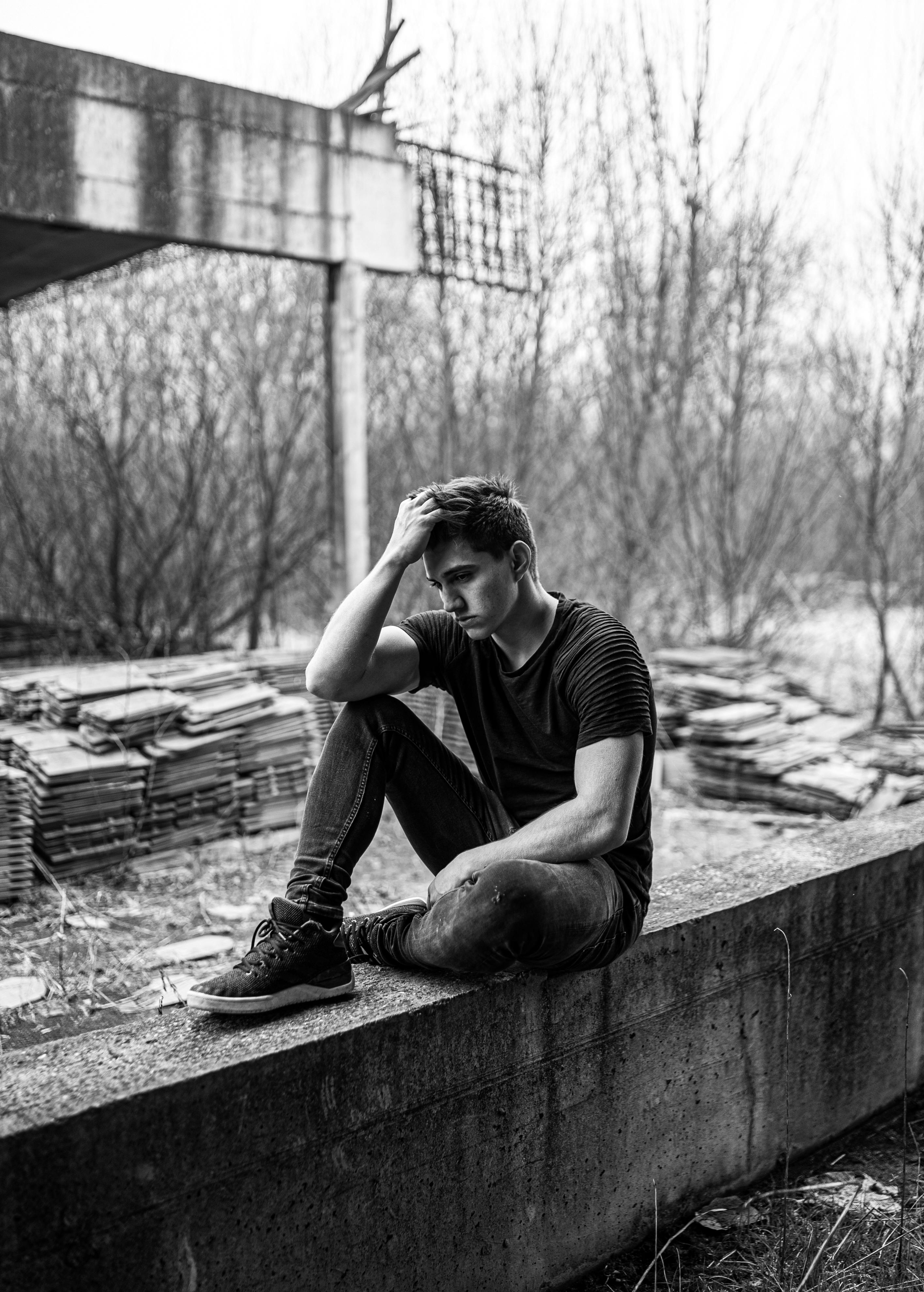 Person looking thoughtfully representing loneliness and mental health risk